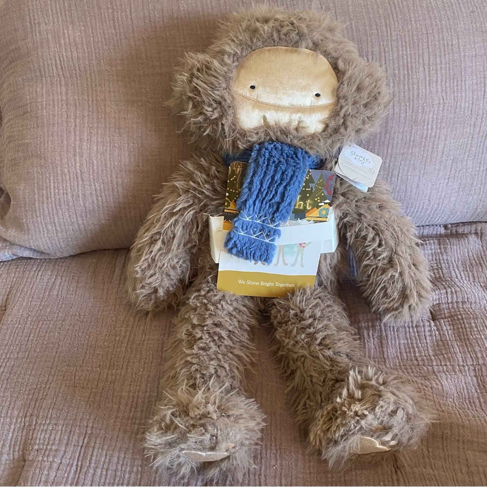 Brown Stuffed Animal with Blue Scarf